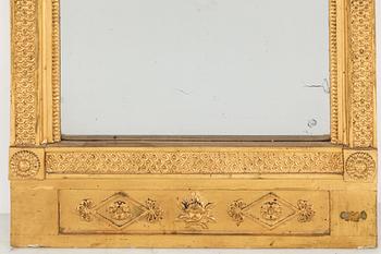 A Swedish Empire mirror, early 19th century.