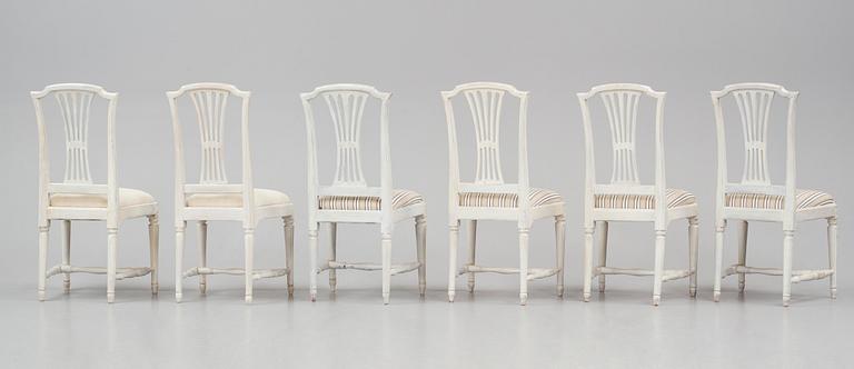 A set of twelve Gustavian chairs by J. Hammarström (master 1794-1812) and E. Ståhl (1794-1820).