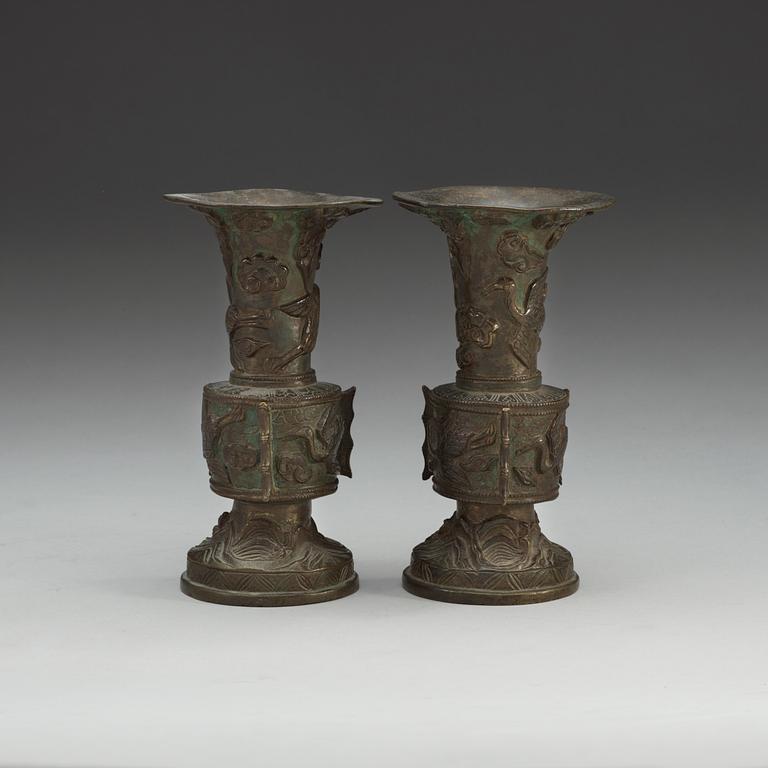 A pair of archaistic bronze vases, Ming dynasty (1368-1644).