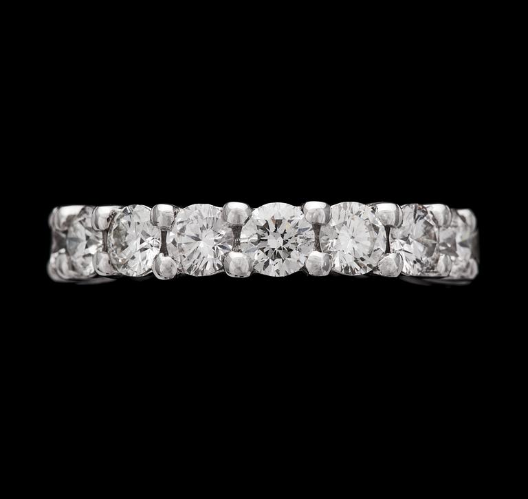 A brilliant cut diamond eternity ring, tot. 3.40 cts.