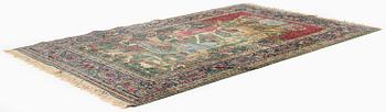 A semi-antique pictoral Kirman Lavar rug, Southeastern Persia (Iran), c. 236 x 156 cm.