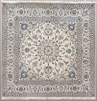 A rug, Nain part silk, ca 197 x 197 cm.