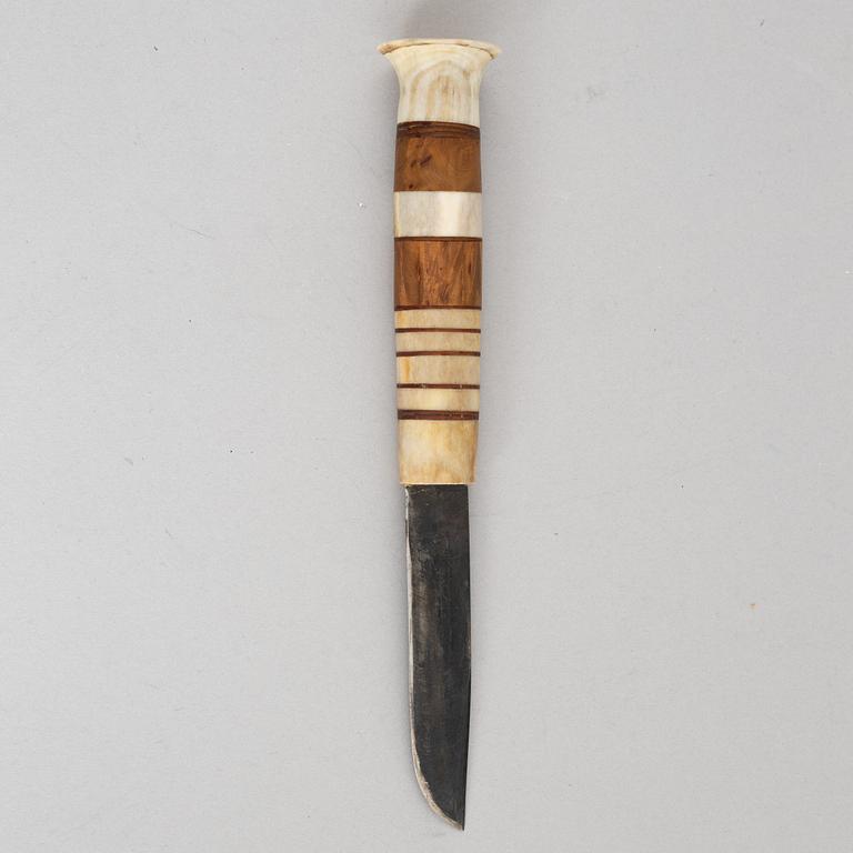 Lars Pirak, a reindeer horn knife, signed.