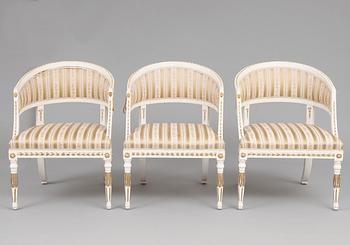 A SET OF THREE ARMCHAIRS.