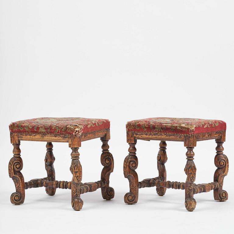 A pair of Swedish carved Baroque stools, circa 1700.
