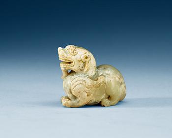 1274. A nephrite figure of a 'Buddhist Lion', Qing dynasty or older.