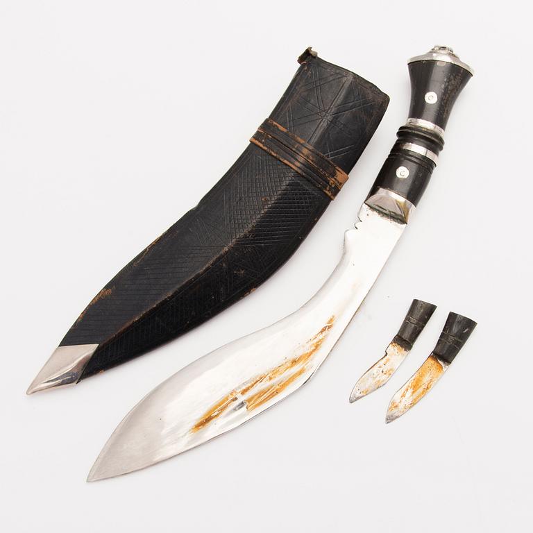 A 20th Century oriental Kukri knife.