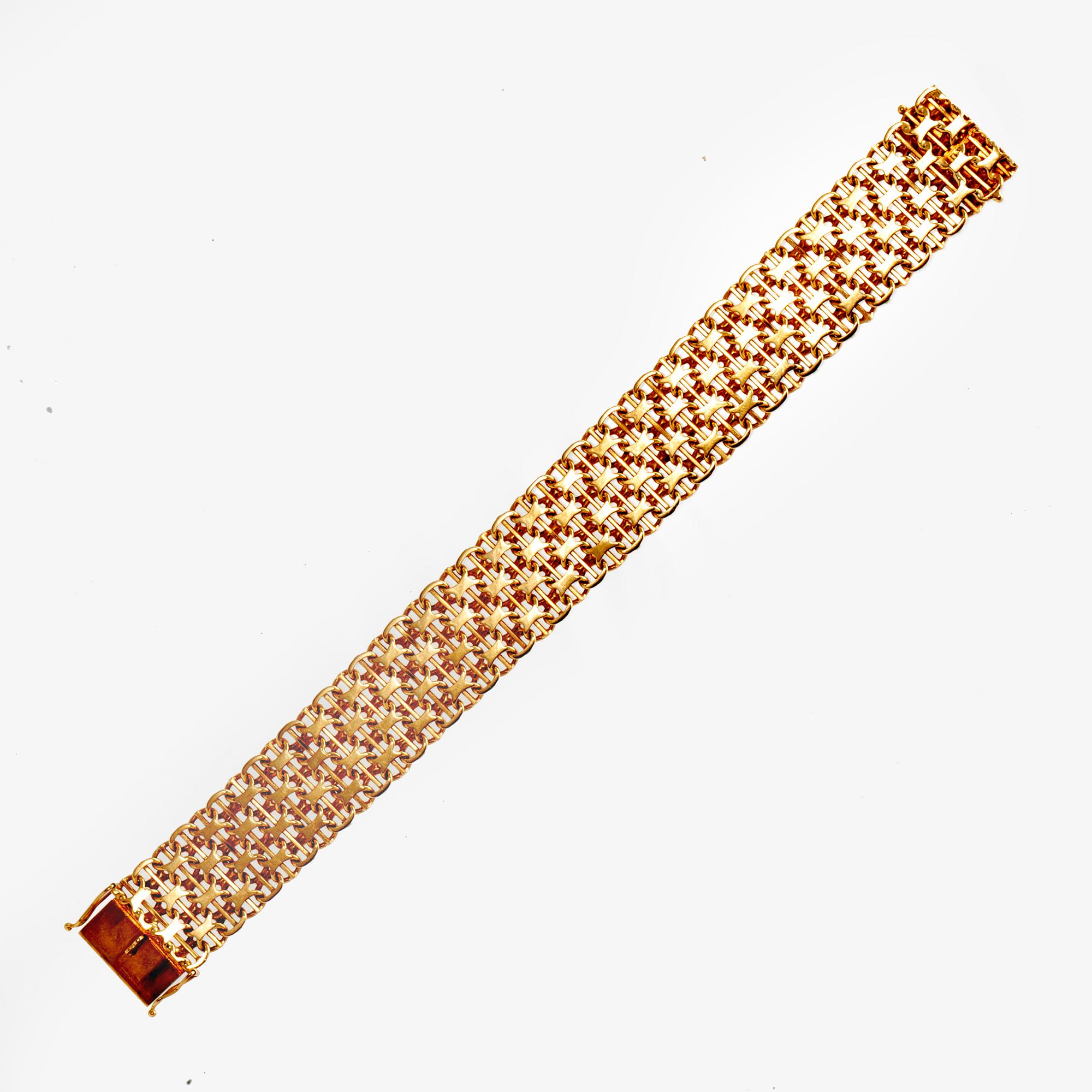 An 18K gold bracelet, 1975.