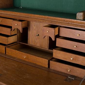A writing cabinet, probably from Småland, first half of the 19th century.