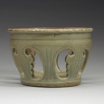 A Longquan celadon reticulated brazier stand, Ming dynasty (1368-1644).