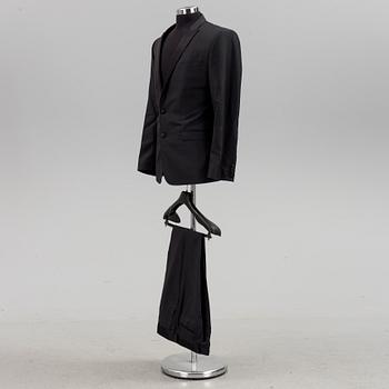 A tuxedo by Dolce & Gabbana, in size 48.