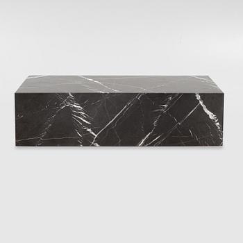 A marble 'Plinth' coffee table from Menu.