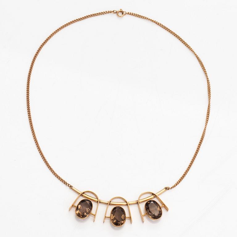 Eero Rislakki, halssmycke, fasettslipade rökkvartser, 14K guld. Westerback, 1960.