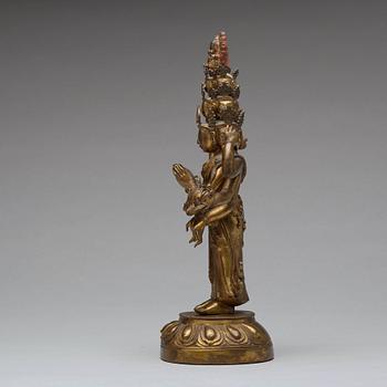 A Tibeto-Chinese gilt bronze figure of eleven-headed Avalokiteshvara, 19th Century.