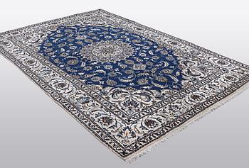 A carpet, Nain, part silk 9 LAA, ca 310 x 203 cm.