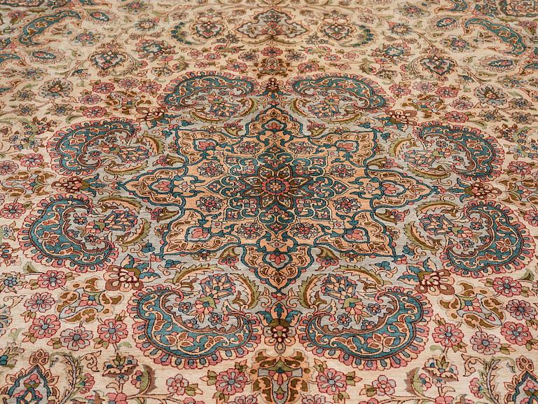 A CARPET, an old silk Turkey, ca 428 x 299-307 cm.