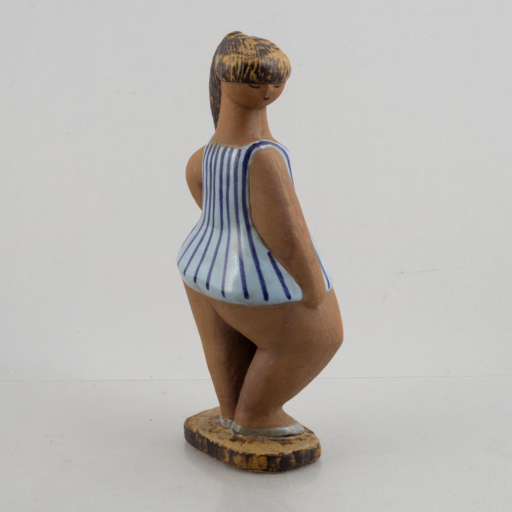 Lisa Larson, a stoneware figurine, 'Dora' from the series 'ABC-flickorna', Gustavsberg.