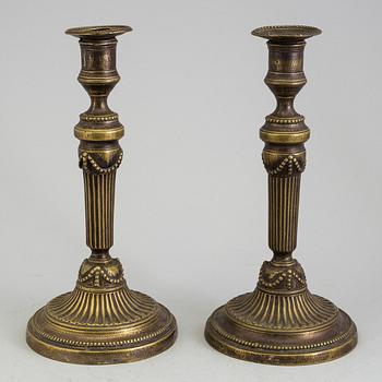 A PAIR OF BRONZE GUSTAVIAN CANDLESTICKS, 18th century.