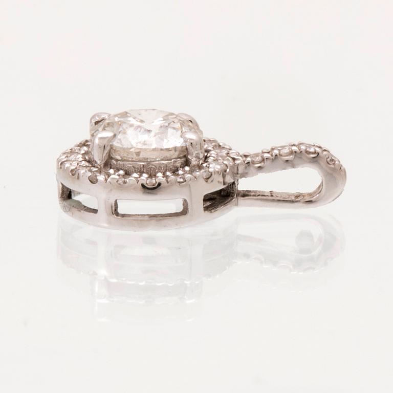 An 18K white gold pendant set with round brilliant cut diamonds GIA cert.