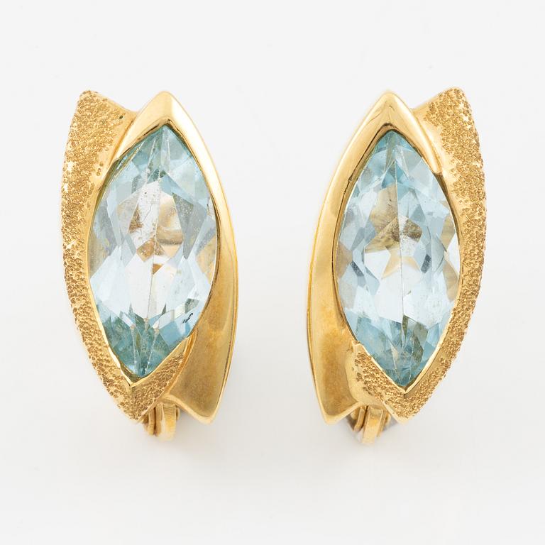 Earrings, 18K gold set with navette-cut blue topazes.