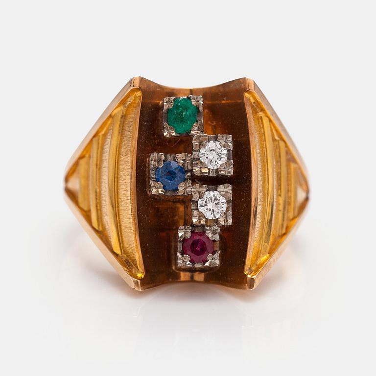 Leo Torikainen, A 14K gold ring with a sapphire, emerald, ruby and diamonds. Pirkan kulta, Tampere 1963.