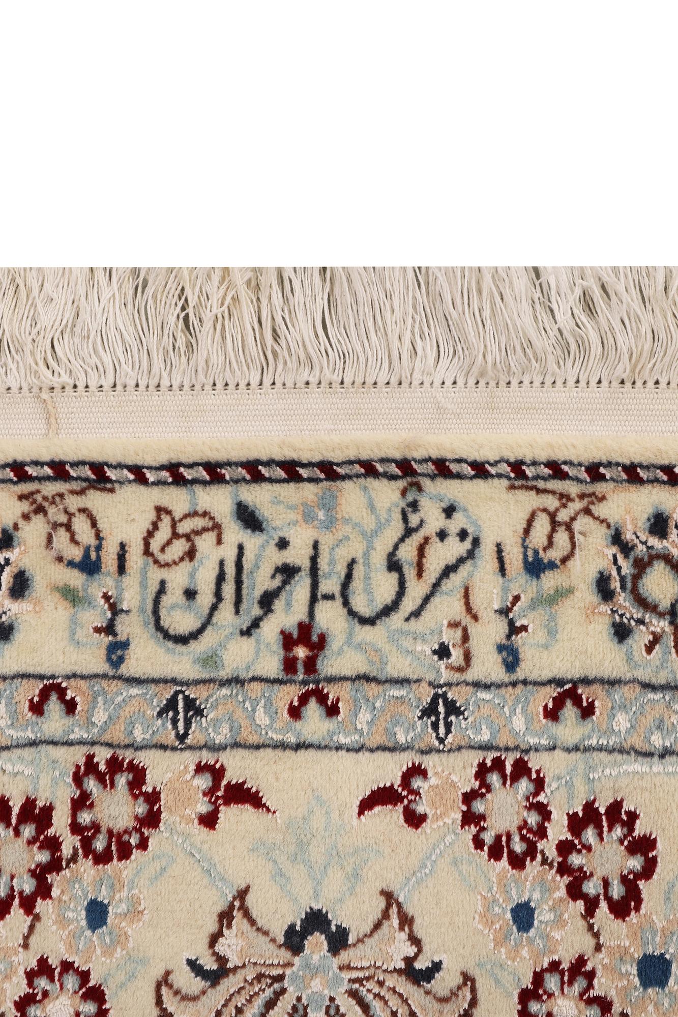 A Nain carpet, part silk, 6 laa, c. 295 x 205 cm.