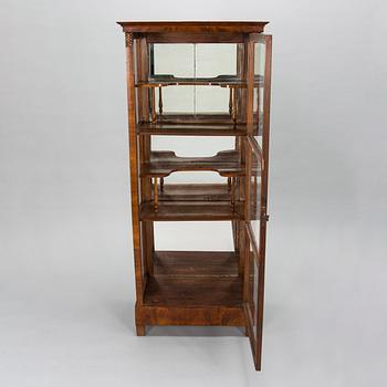 A mid-19th-century vitrine cabinet, possibly from the Baltics.