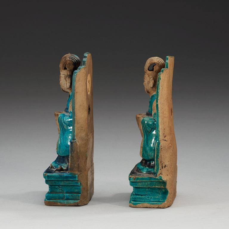 Two turquoise and purple glazed figures of daoistic dignitaries, Ming dynasty, 17th Century.