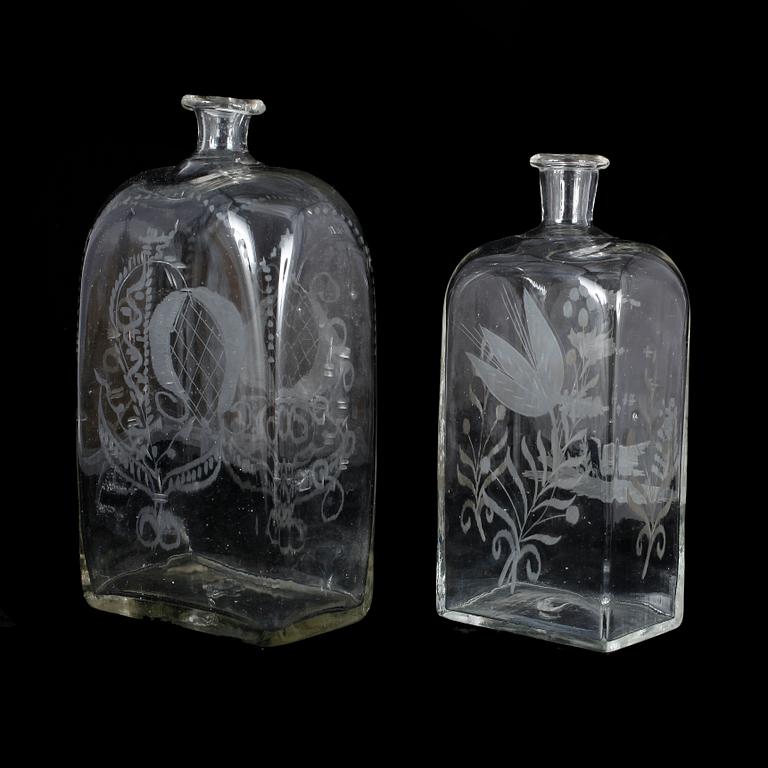 BRÄNNVINSFLASKOR, 2 st, glas, 1800-tal.