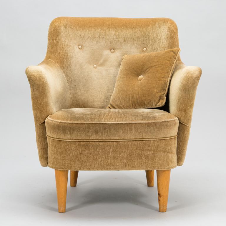 A mid-20th-century sofa and armchair.