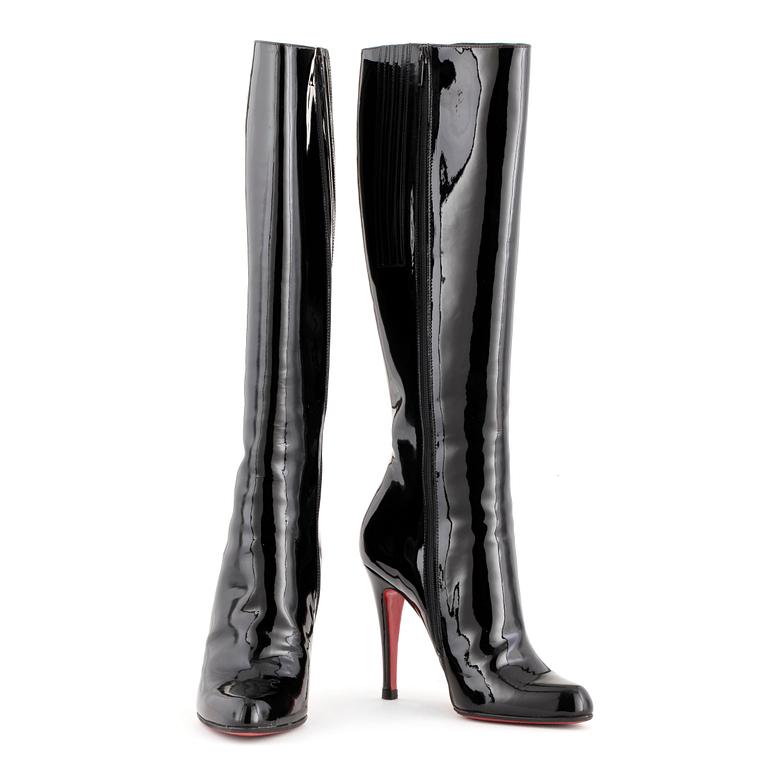 CHRISTIAN LOUBOUTIN, a pair of black patent leather high heeled boots, size 37.