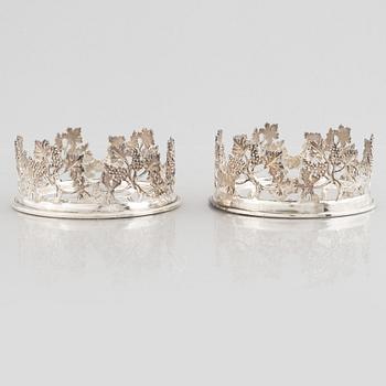 Coasters/flaskunderlägg, ett par, sterlingsilver, 1900-tal.