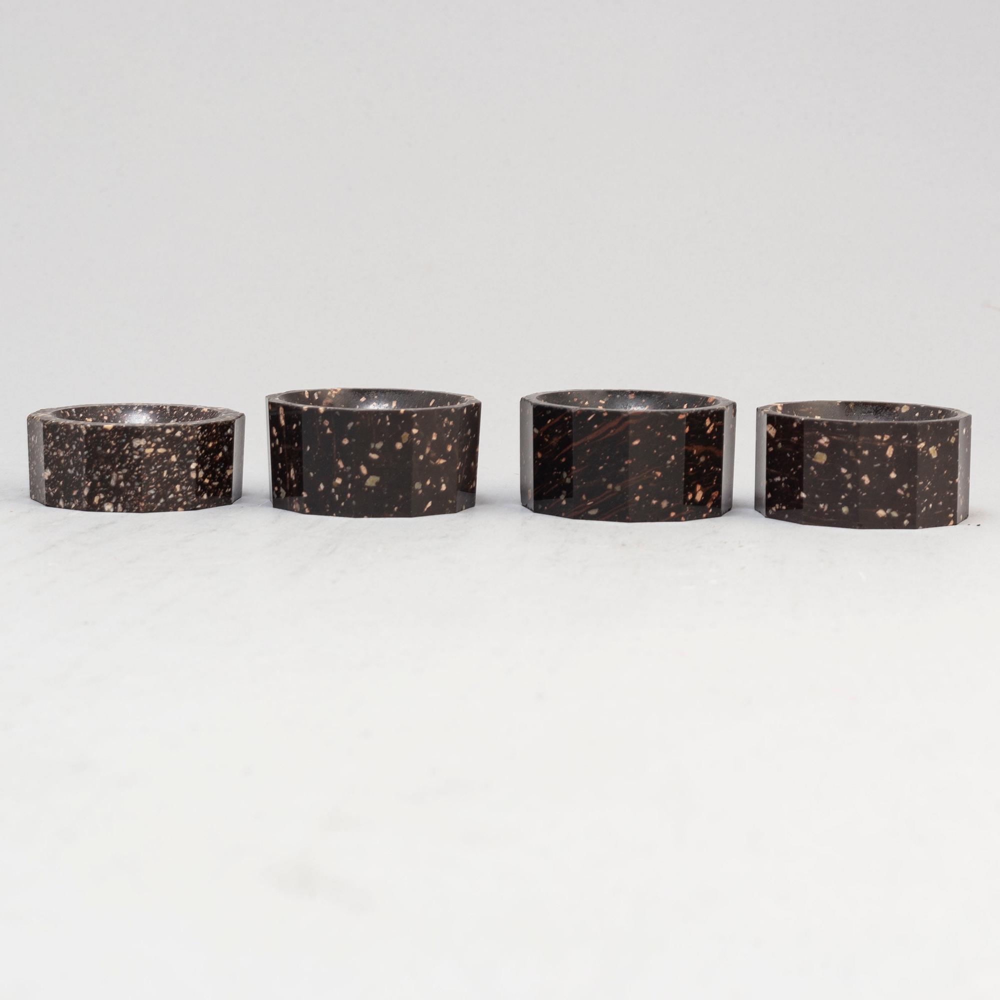 Three plus one porphyry salt cellars, Empire, second quarter of the 19th century.