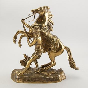 A bronze sculpture after Guillaume Coustau.