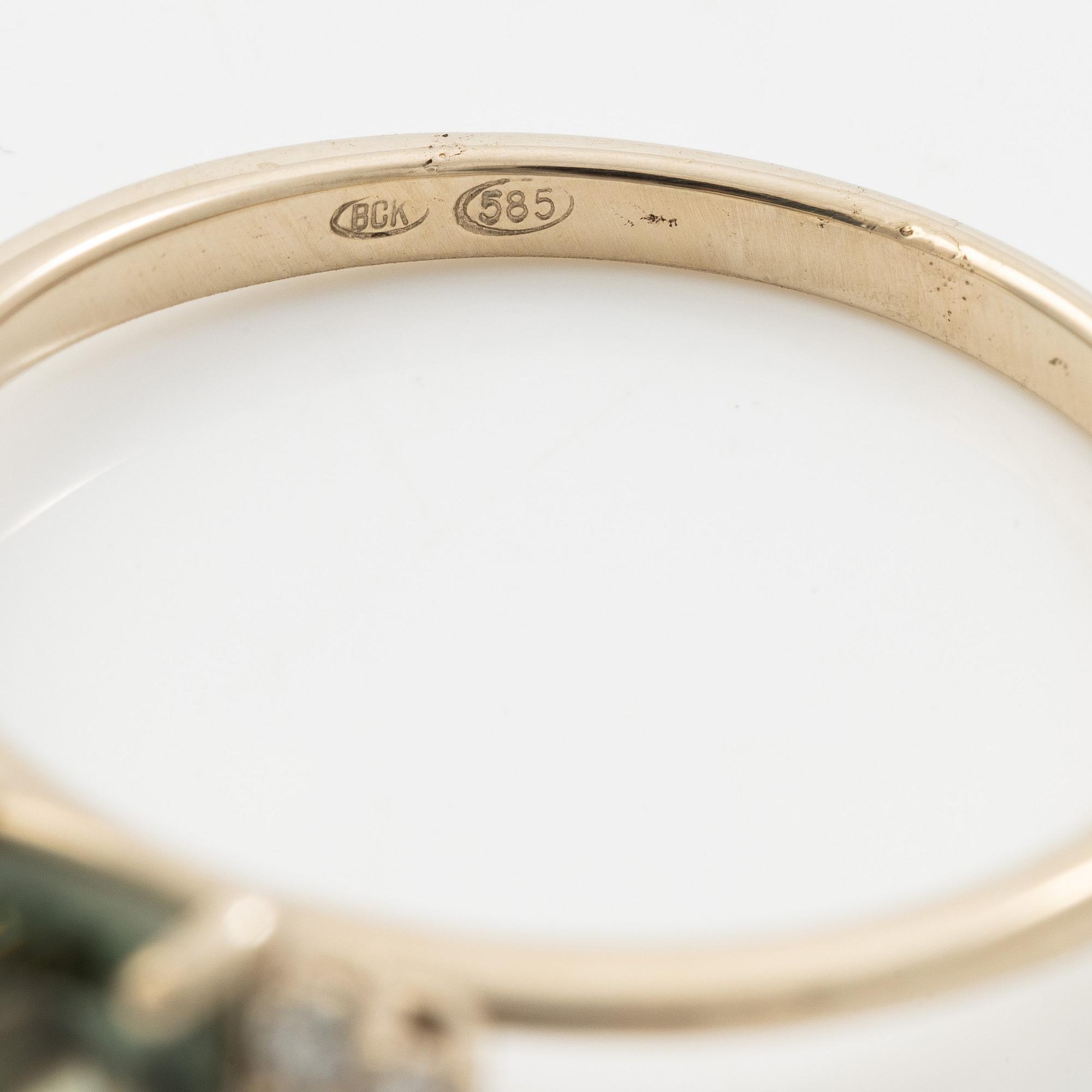 Ring in 14K white gold with tourmaline and brilliant-cut diamonds.