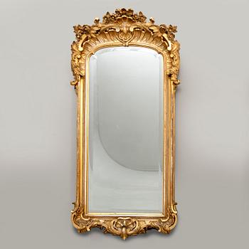 A Swedish Neo Rococo gilded signed mirror 1880s.