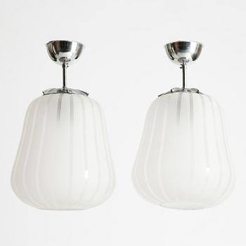 A pair of Swedish Modern ceiling lamps, possibly Flygsfors, Sweden, 1940's.