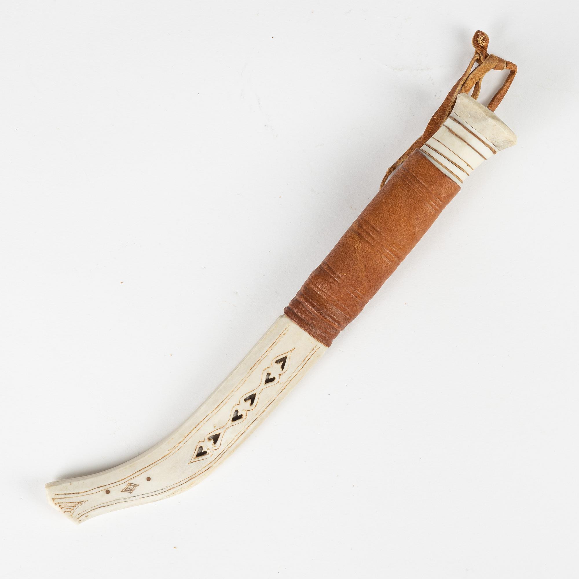A reindeer horn knife by Per Sunna, signed.