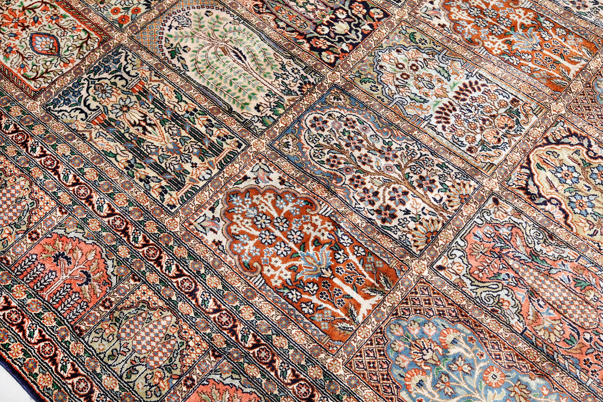 A silk Kashmir carpet, 286 x 265 cm.