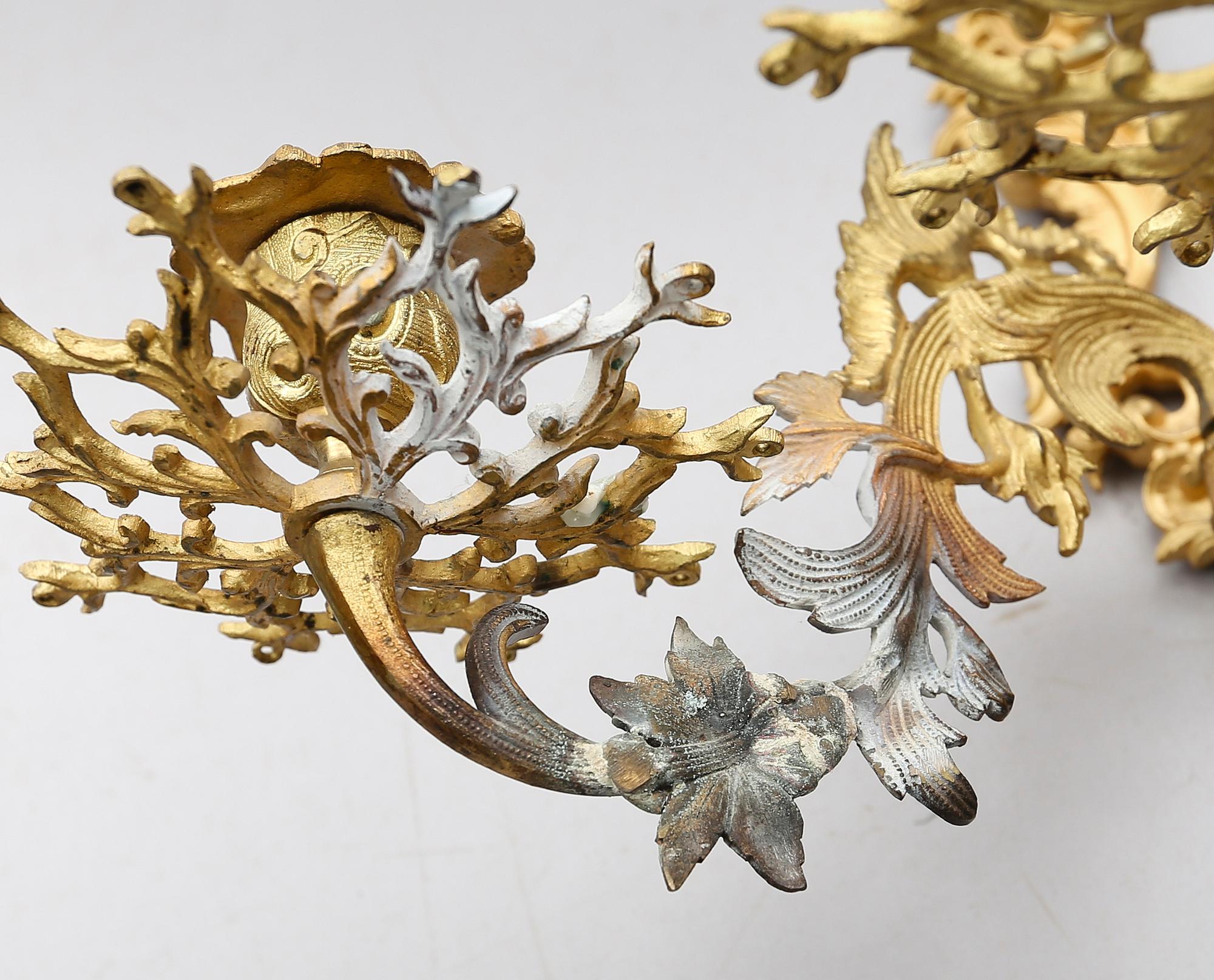 VÄGGLAMPETTER, 1 par, förgylld brons, 1800-talets andra hälft.