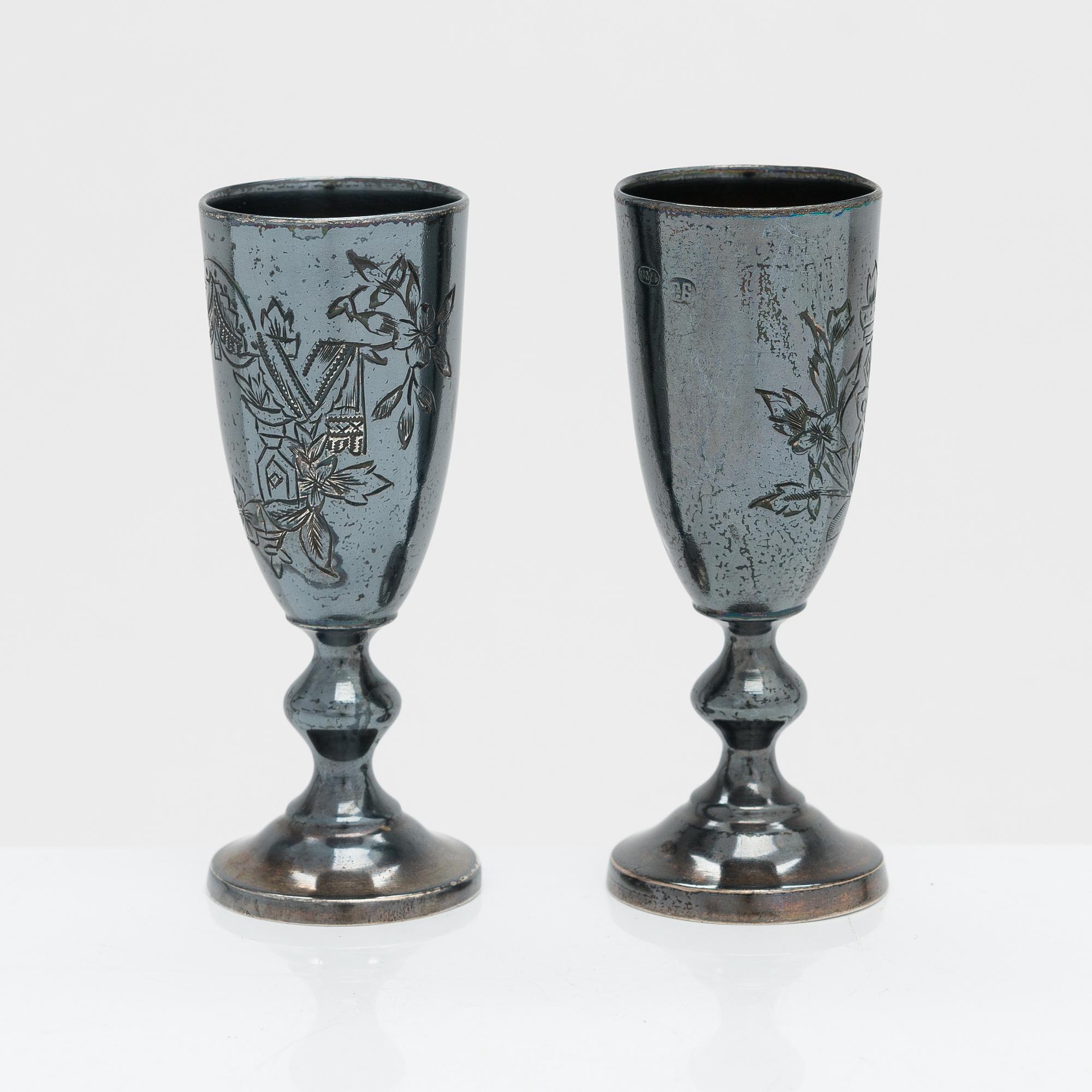 An 8-piece silver vodka set, Moscow 1882-1899. Cyrillic maker's mark G.B.