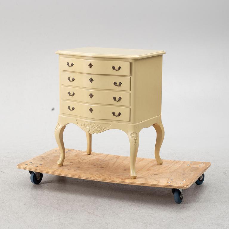 A Rococo style chest of drawers, mid-20th century.