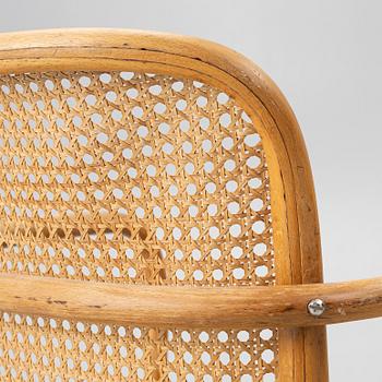 A matched pair of armchairs from Thonet, circa 1900 and late 20th Century.