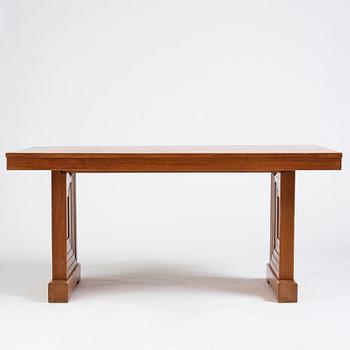 Oscar Nilsson, attributed to, a stained oak table, probably executed at Isidor Hörlin AB, Stockholm, 1930-40's.