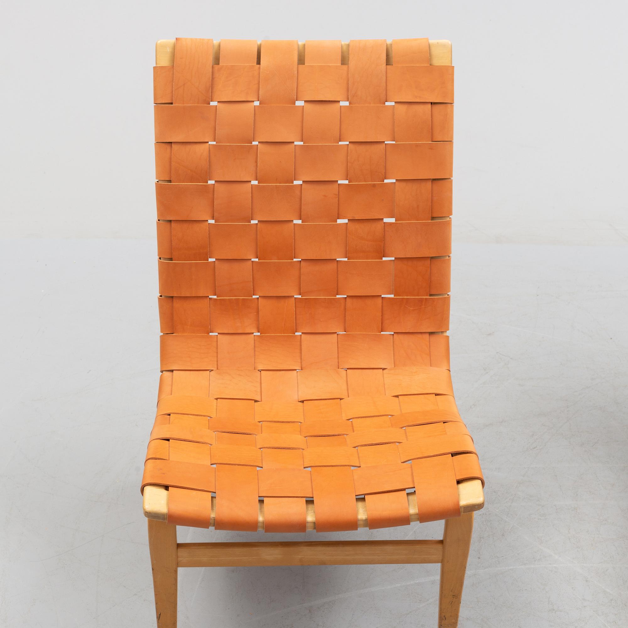 A pair of Bruno Mathsson 'Eva' lounge chairs, by Karl Mathsson, for VÄrnamo, 1965 and 1970.