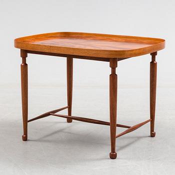 A mahogany veneered model 974 side table from Svenskt Tenn.