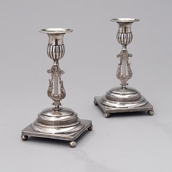 A PAIR OF FINNISH SILVER CANDLESTICKS, Wilhelm Fahlström 1818-1828, Helsinki.