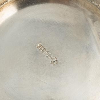 Three silver bowls and creamer, Sweden and Germany, 20th century.