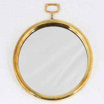 Josef Frank or Estrid Ericson, a model "H2672" brass mirror,Firma Svenskt Tenn, 1950's/60's.