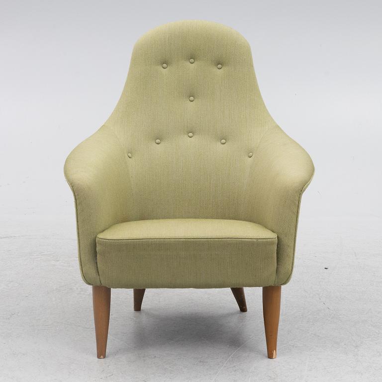 Kerstin Hörlin-Holmquist, a 'Stora Adam' armchair, Nordiska Kompaniet, Sweden, mid 20th Century.